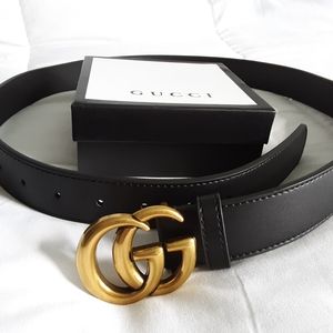 GUCCI leather belt with double G brushed brass